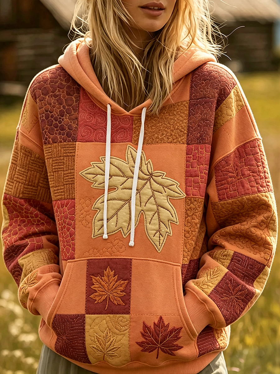 Kvinnlig höstlig mysig hoodie med lövflikar och lövmönster