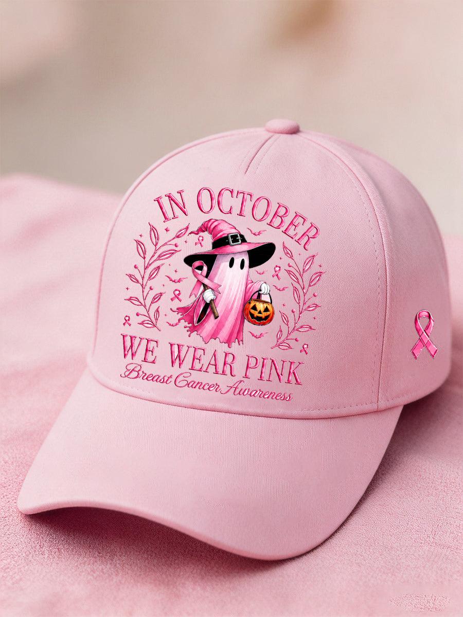 Unisex I oktober bär vi rosa Halloween-keps med prinsessspöke och budskap om bröstcancermedvetenhet