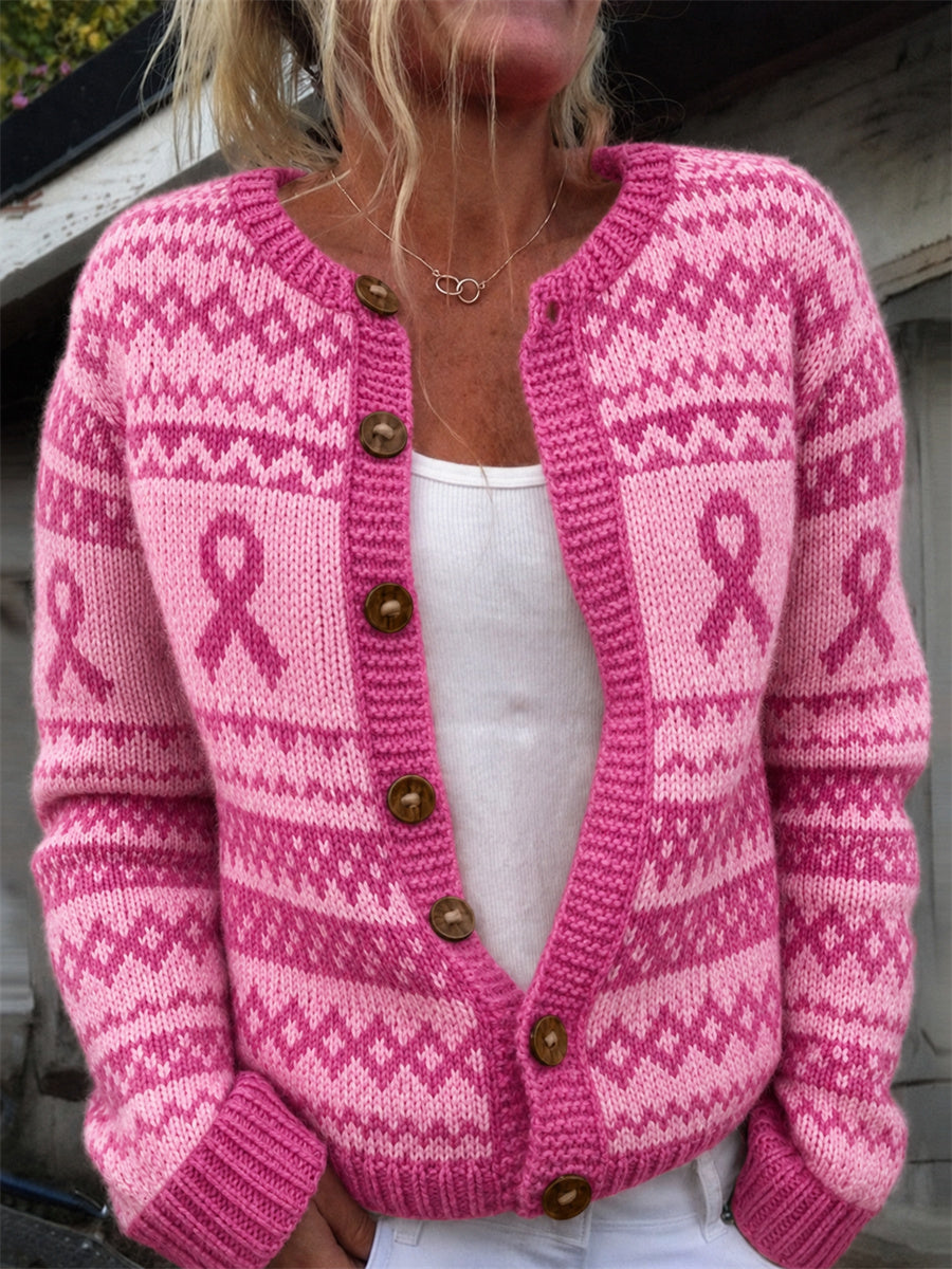 Kvinnlig mysig kofta med rosa band och ö-tryck för bröstcancermedvetenhet