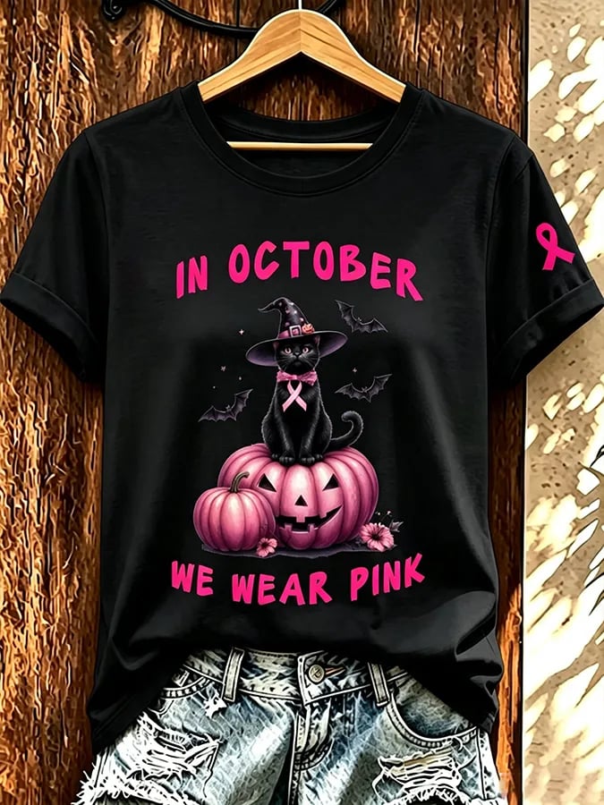 Kvinnors I oktober bär vi rosa T-shirt med korta ärmarna