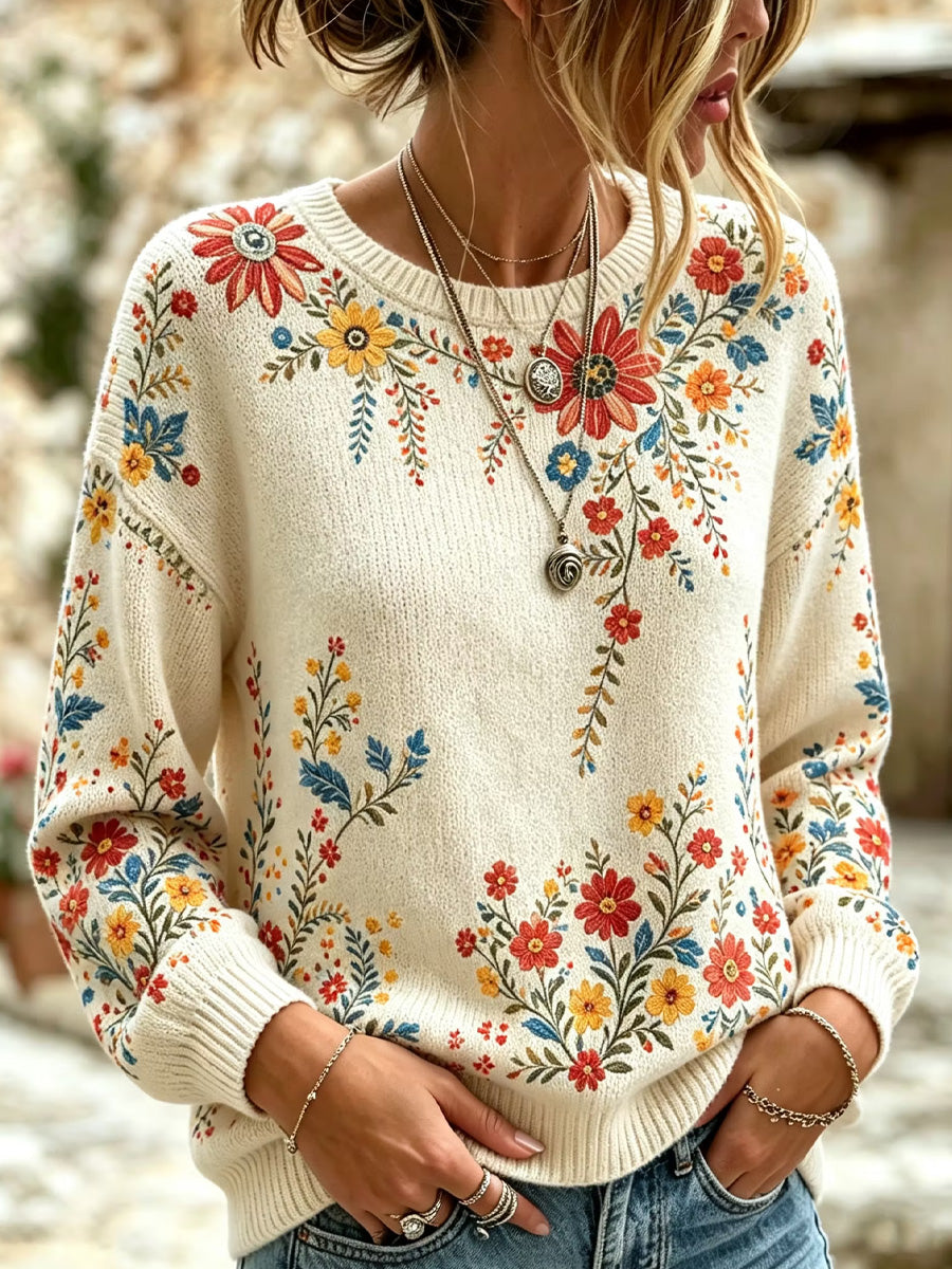 Kvinnlig avslappnad och bekväm tröja med rund hals och vintageartprint med blommor
