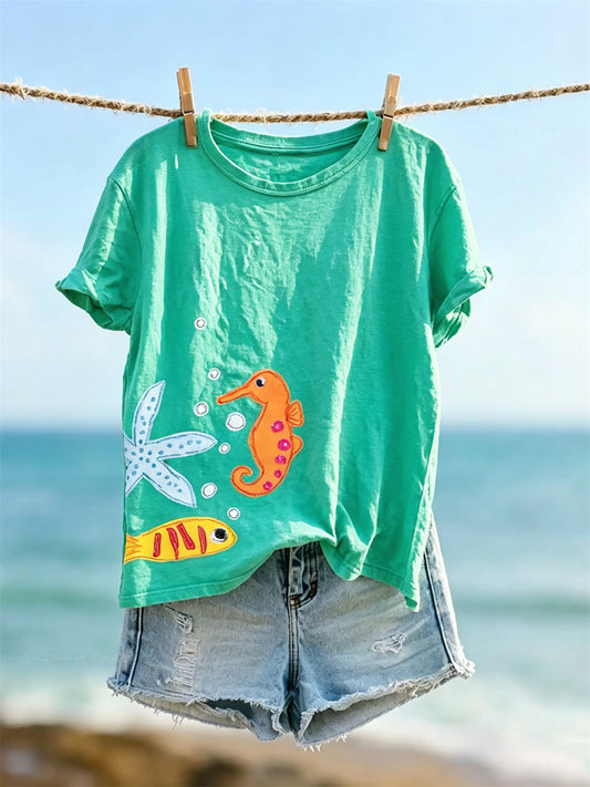 Damens ljuvliga sjöhästa Starfish & Fish Skriv ut kortärmad T-shirt