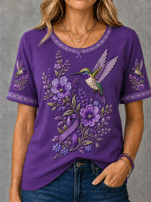 T-shirt för Alzheimers-medvetande med lila blommönster och kolibri, till stöd för drabbade kvinnor
