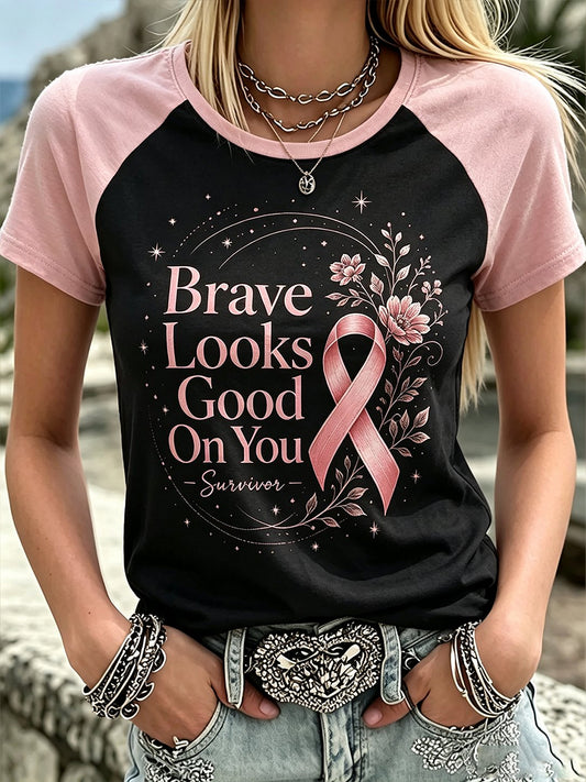 T-shirt med korta ärmar och tryck för att höja medvetenheten om bröstcancer hos kvinnor