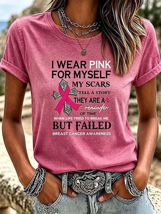 Kvinnlig t-shirt med tryckt budskap om bröstcancer och avslappnad stil