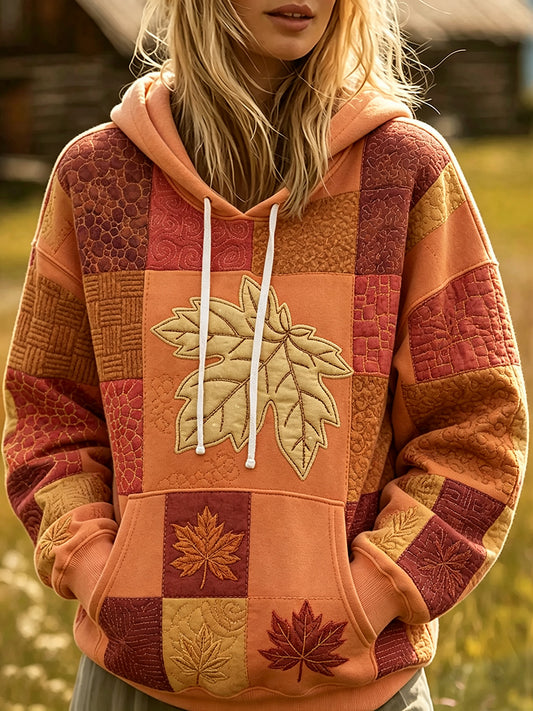 Kvinnlig höstlig mysig hoodie med lövflikar och lövmönster