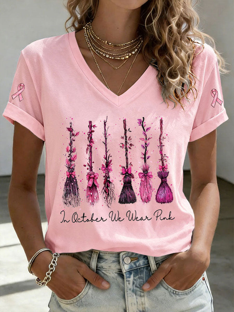 Kvinnors I oktober bär vi rosa T-shirt med korta ärmarna