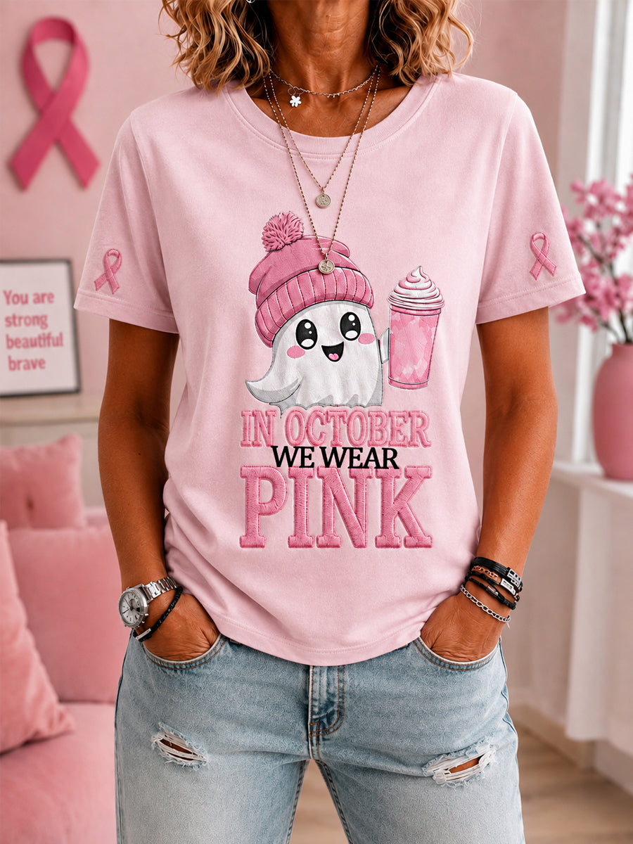 Kvinnors oktoberklädsel: Halloween-t-shirt i rosa med spöktryck till stöd för bröstcancermedvetenhet