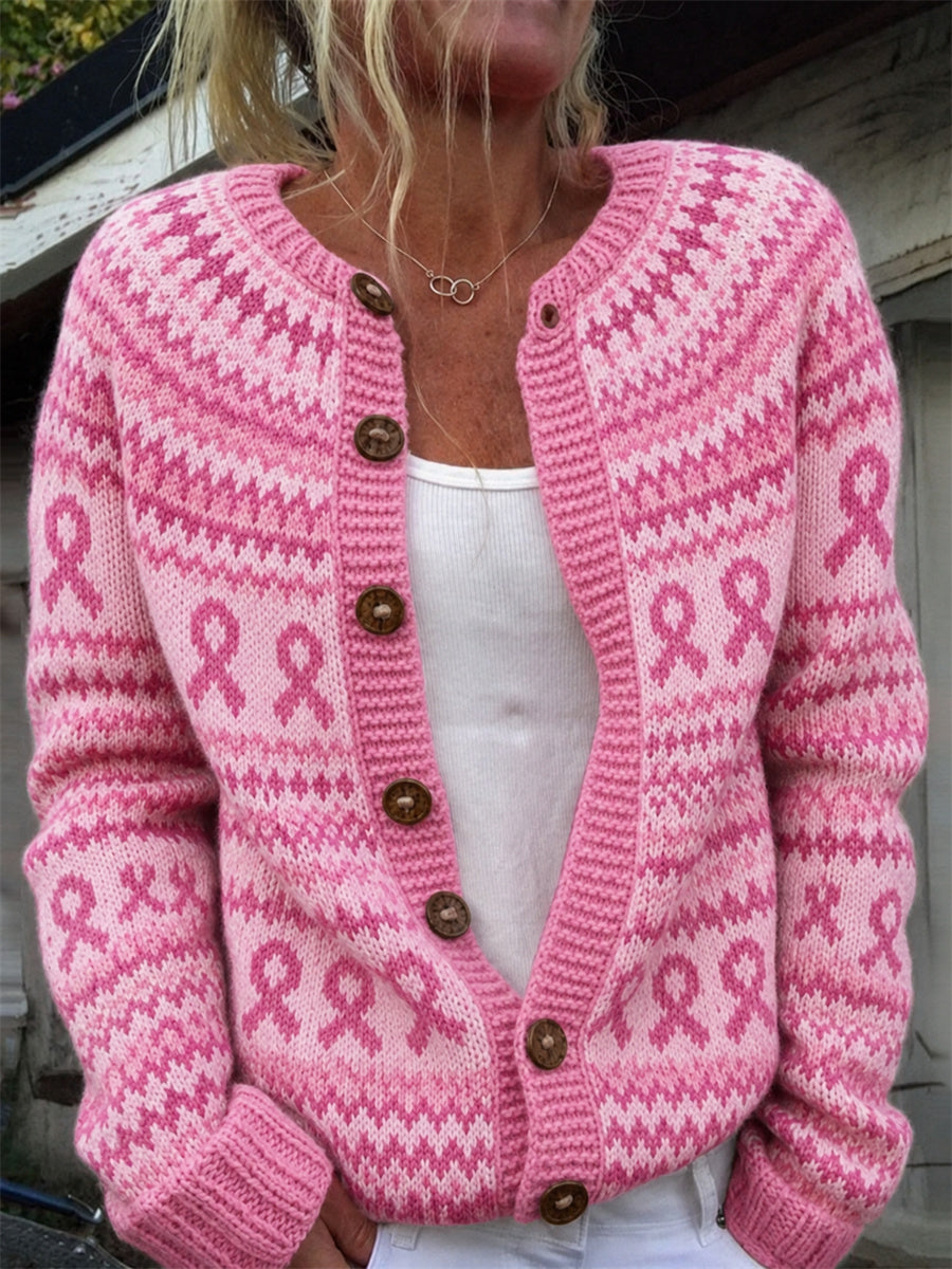 Kvinnlig mysig kofta med rosa band och ö-tryck för bröstcancermedvetenhet