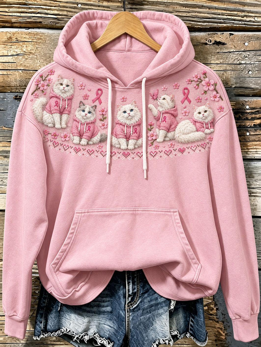 Kvinnlig avslappnad hoodie med kattmönster och design med rosa välgörenhetsband