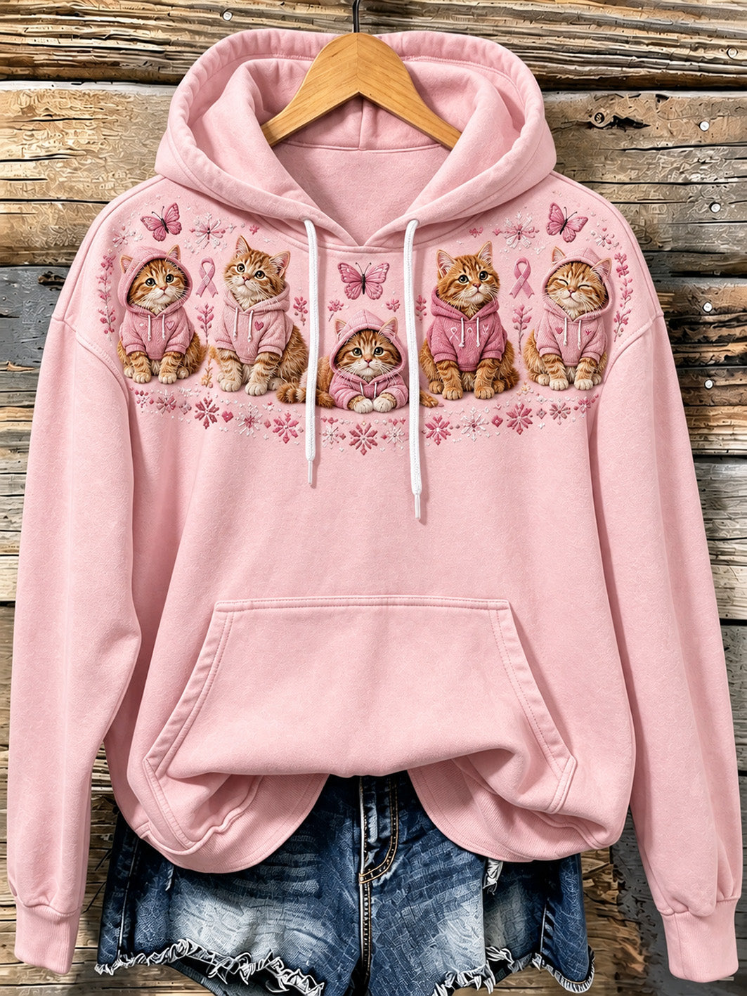 Kvinnlig avslappnad hoodie med kattmönster och design med rosa välgörenhetsband