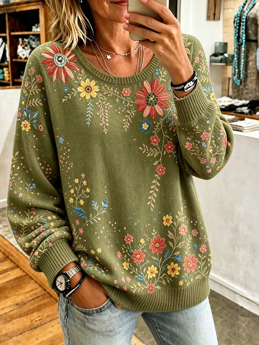 Kvinnlig avslappnad och bekväm tröja med rund hals och vintageartprint med blommor